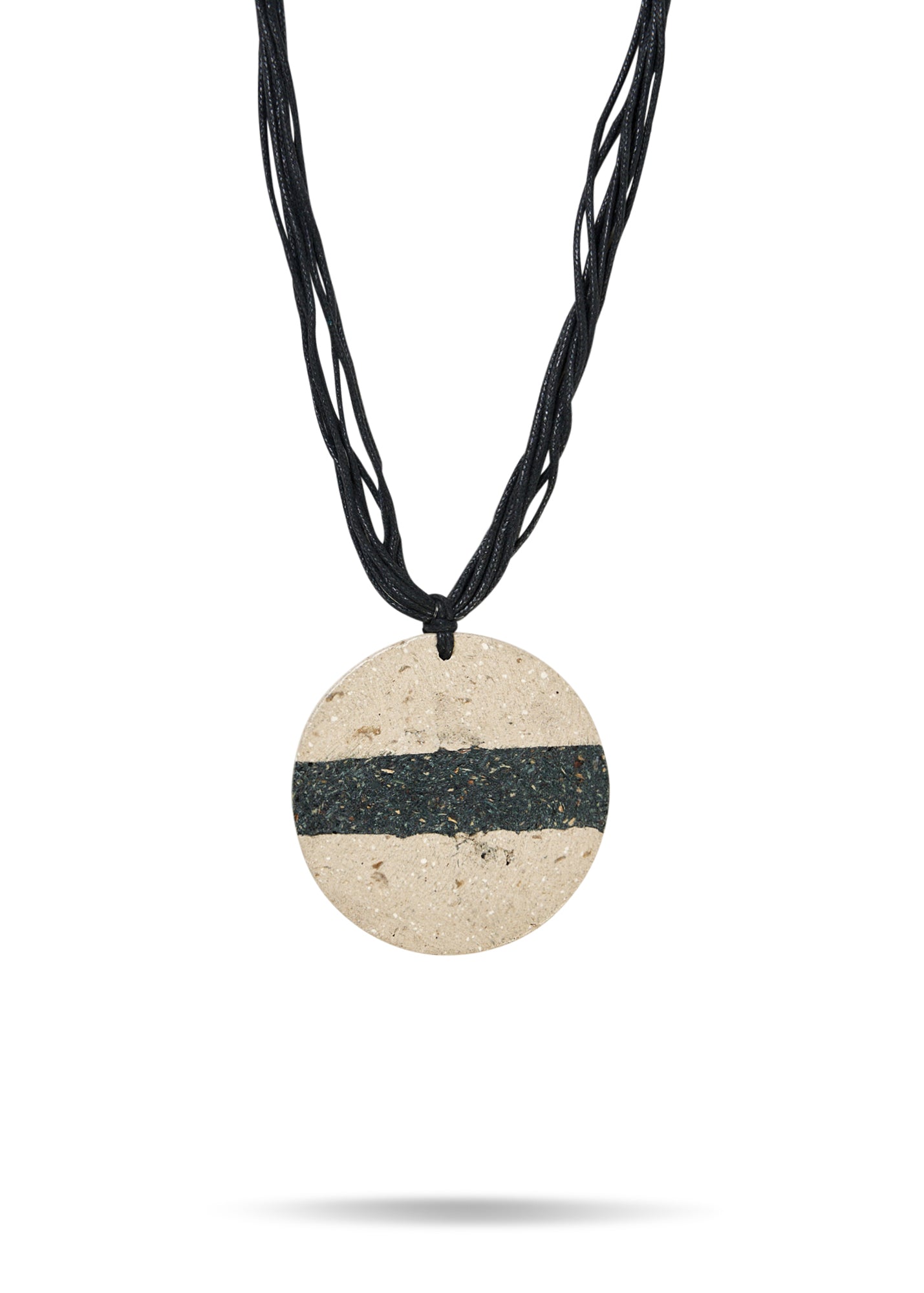 Paper mache necklace with a circle and a black stripe in the middle