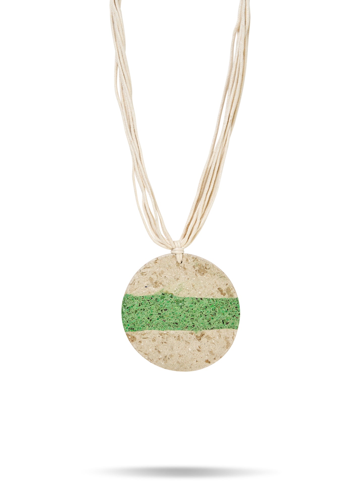 Paper mache necklace with a circle and a stripe in the middle, green