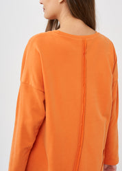 Long sleeve dress with external seams, orange