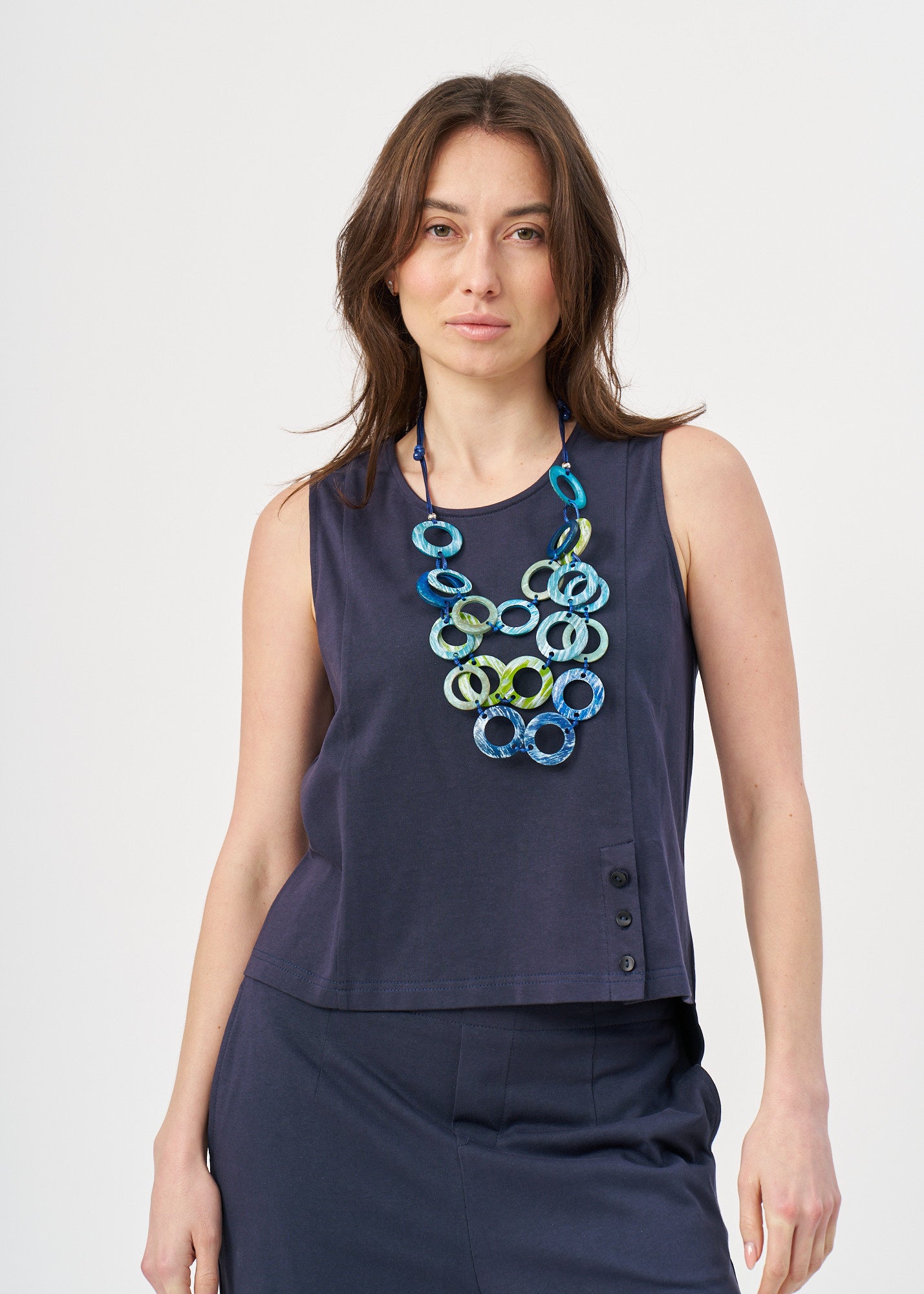 Blue jersey tank top with slit in the hem