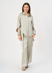 Green satin button-down shirt with open sleeves