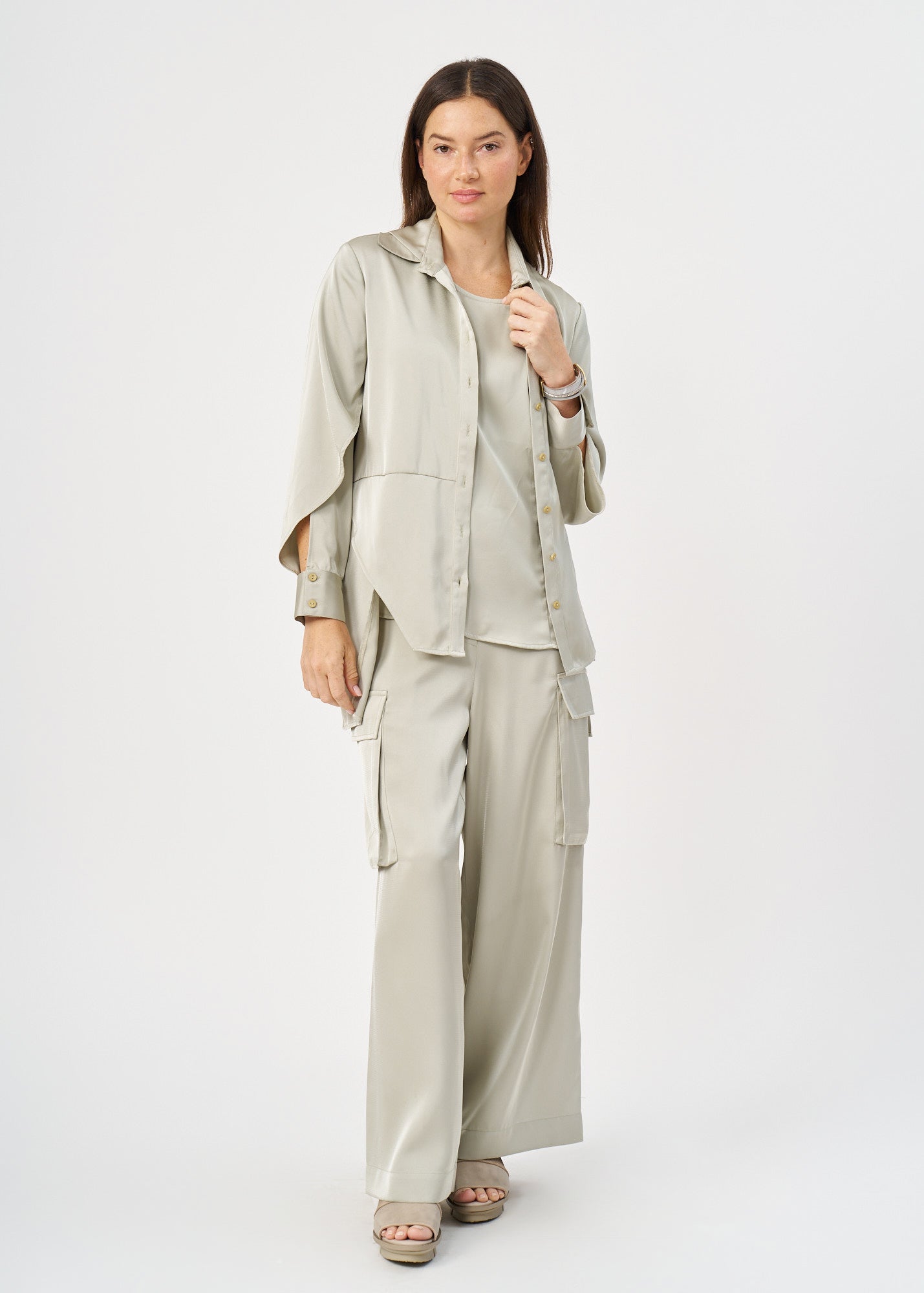 Green satin button-down shirt with open sleeves