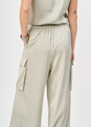 Green satin pants with pockets