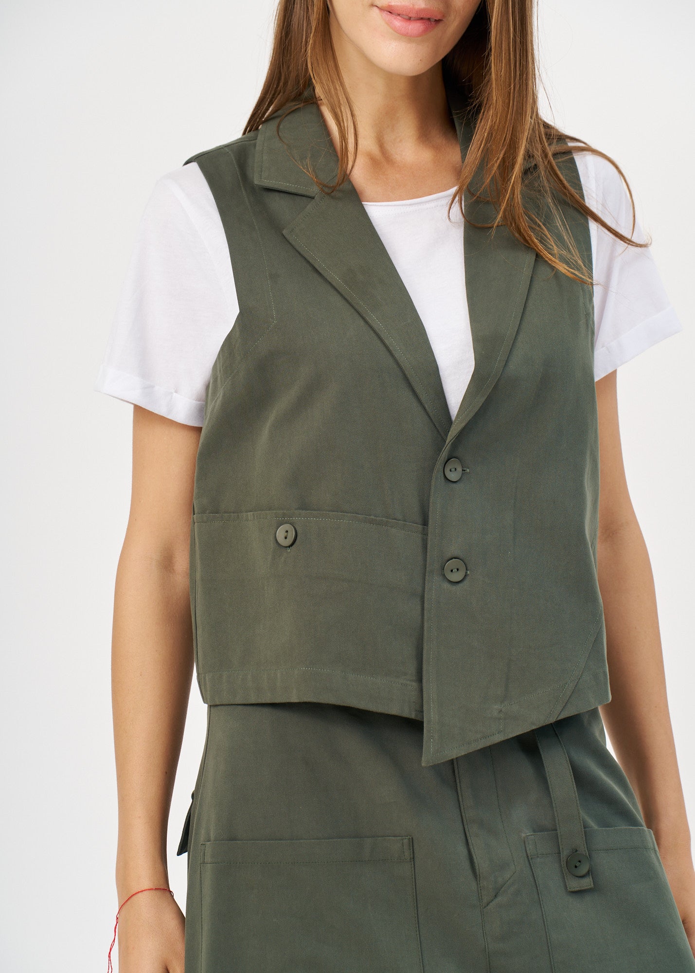 וסט סיומת אסימטרית ירוק כהה