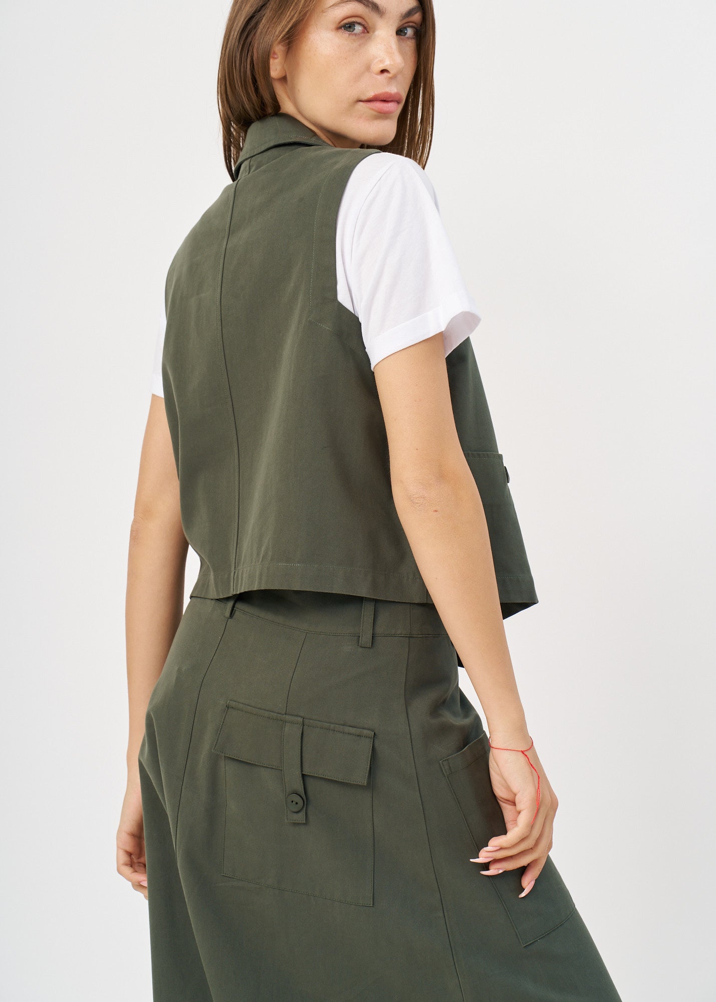 וסט סיומת אסימטרית ירוק כהה