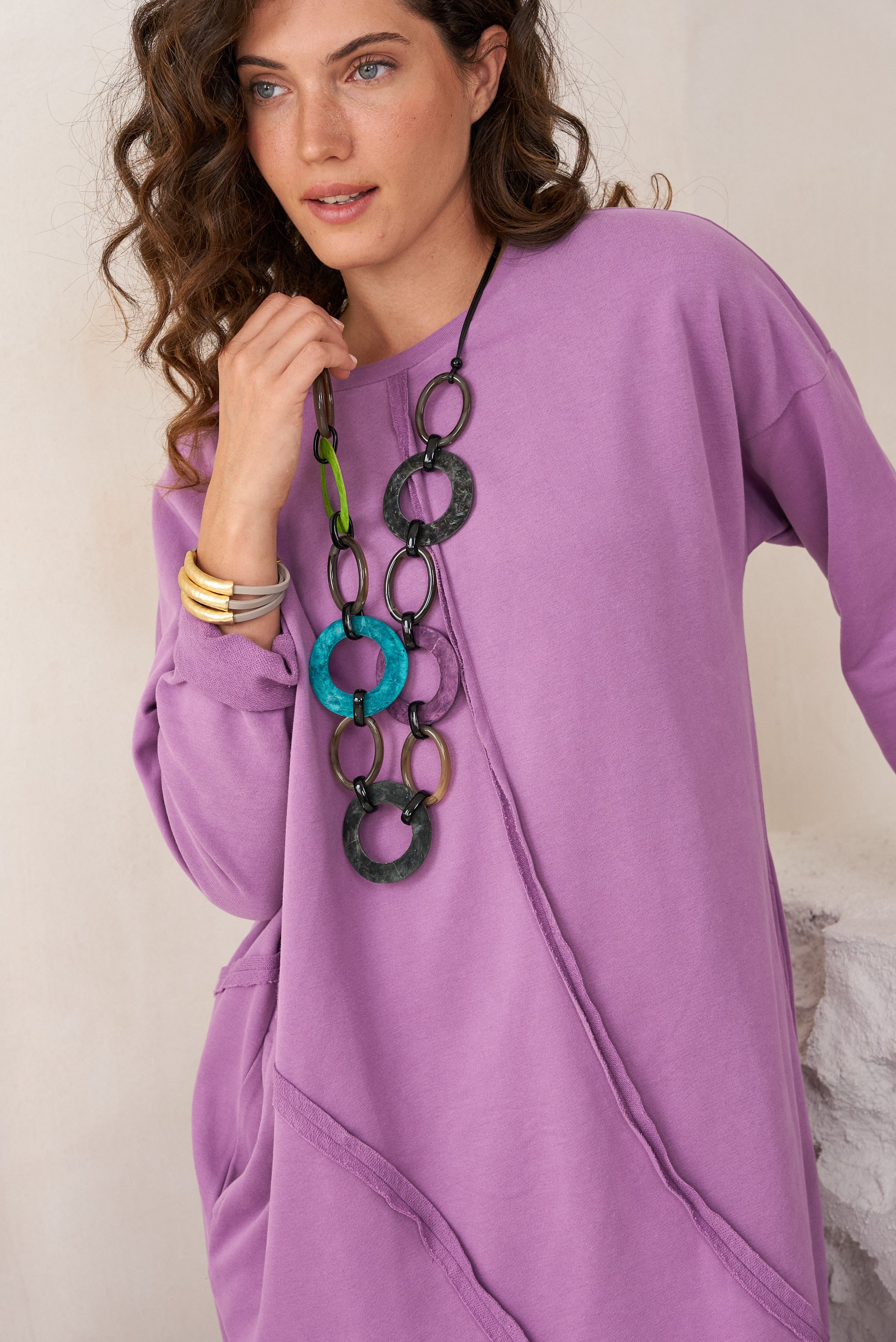 Handcrafted seashell necklace with purple wash dyeing