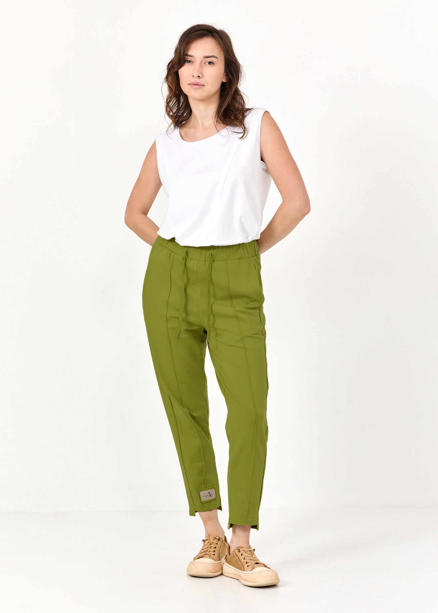 Pants seam in the middle and a green patch
