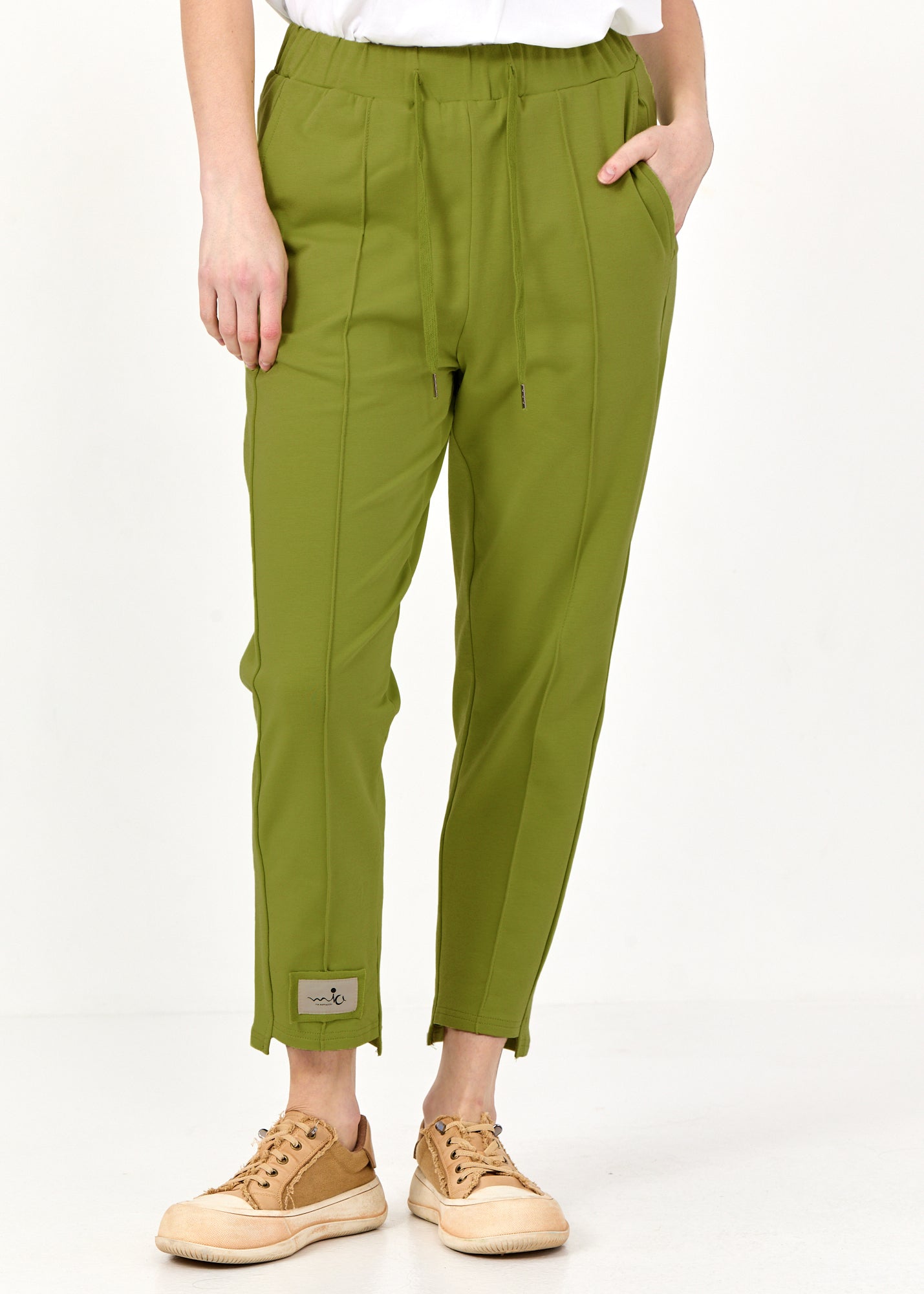 Pants seam in the middle and a green patch