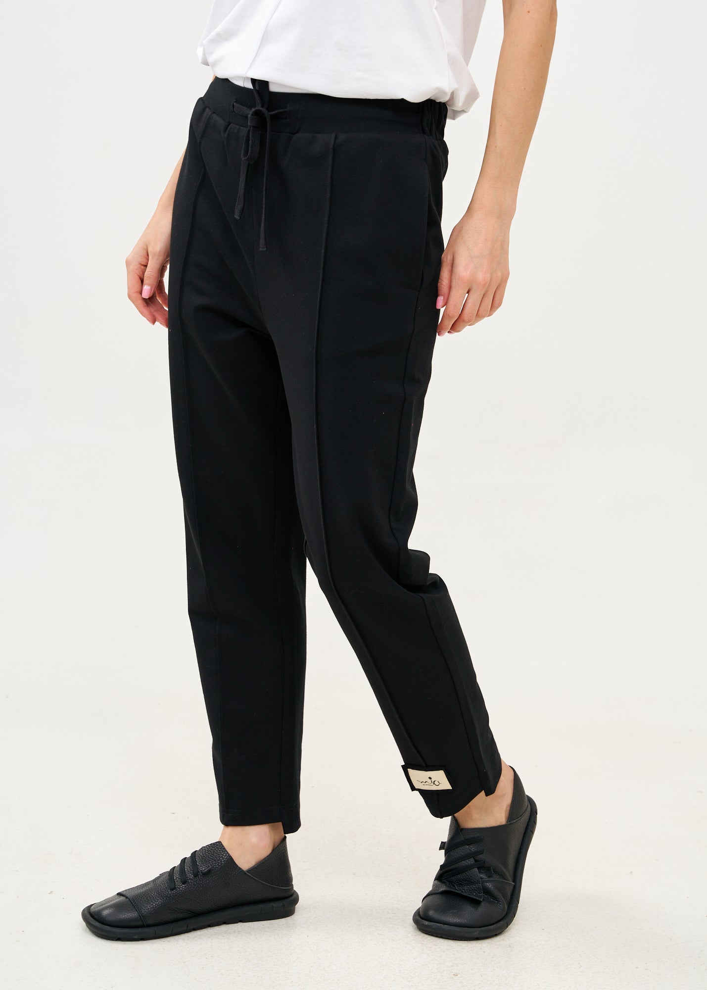 Pants seam in the middle and a black patch