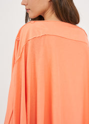 Slim top with orange buttons