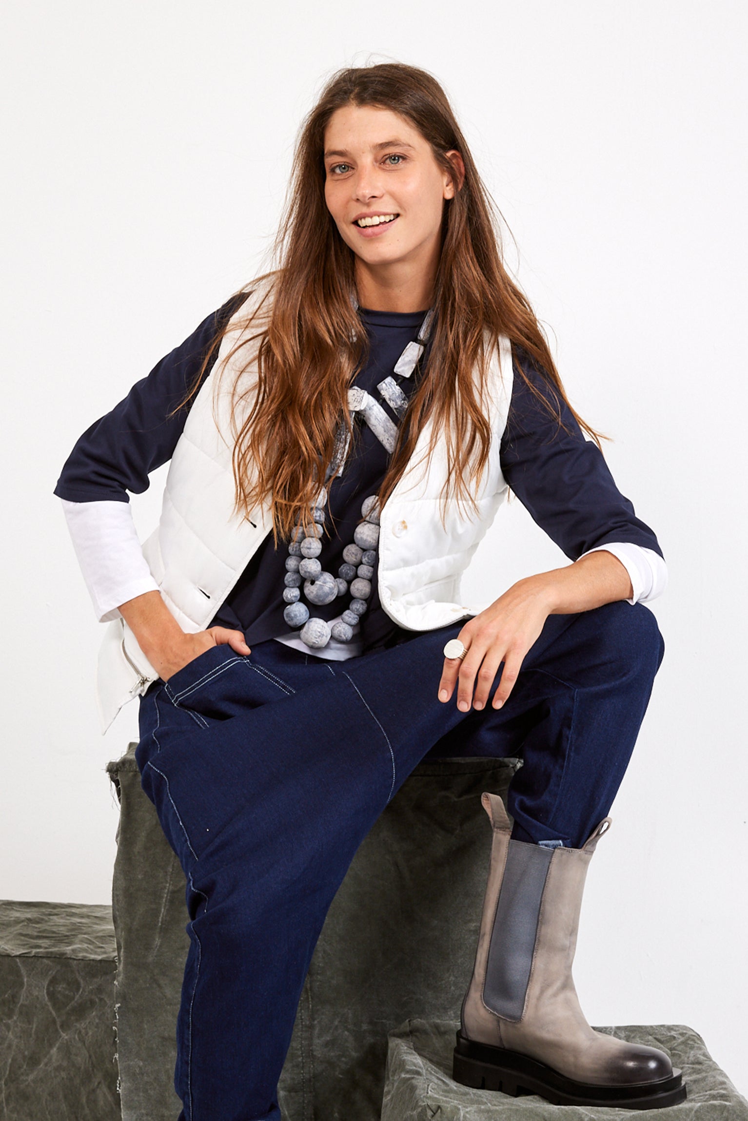 A chain of flaking wood attached brown rectangular shapes