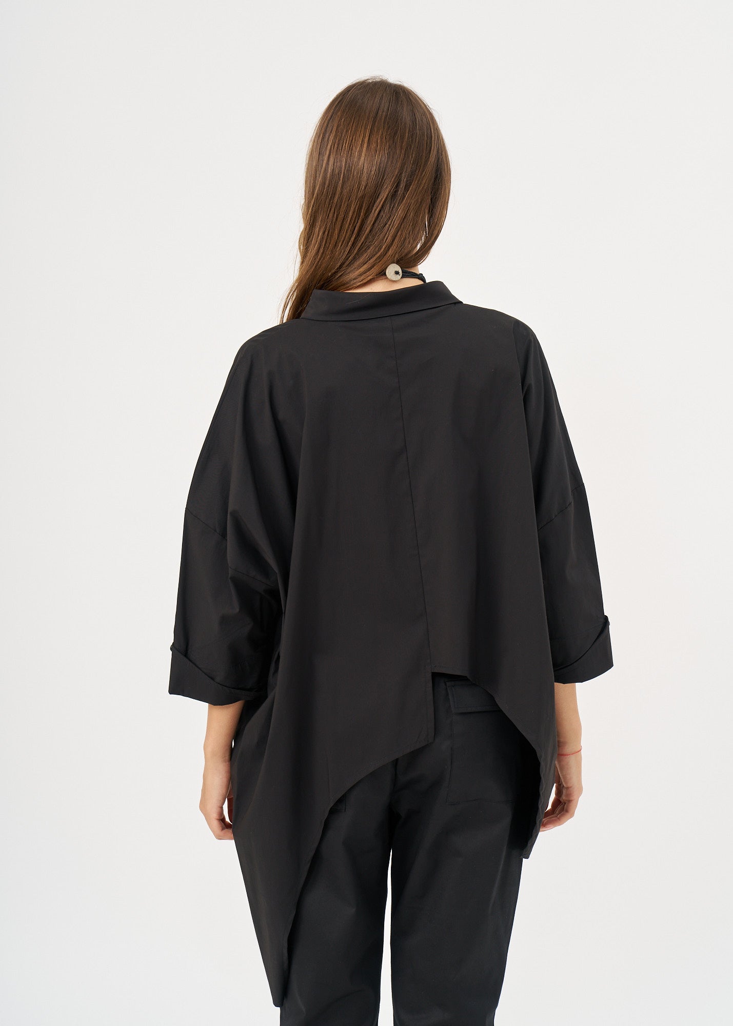 Black button-down shirt with rounded hem