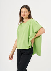 A shirt without a shirt that expands on the sides with a green loop