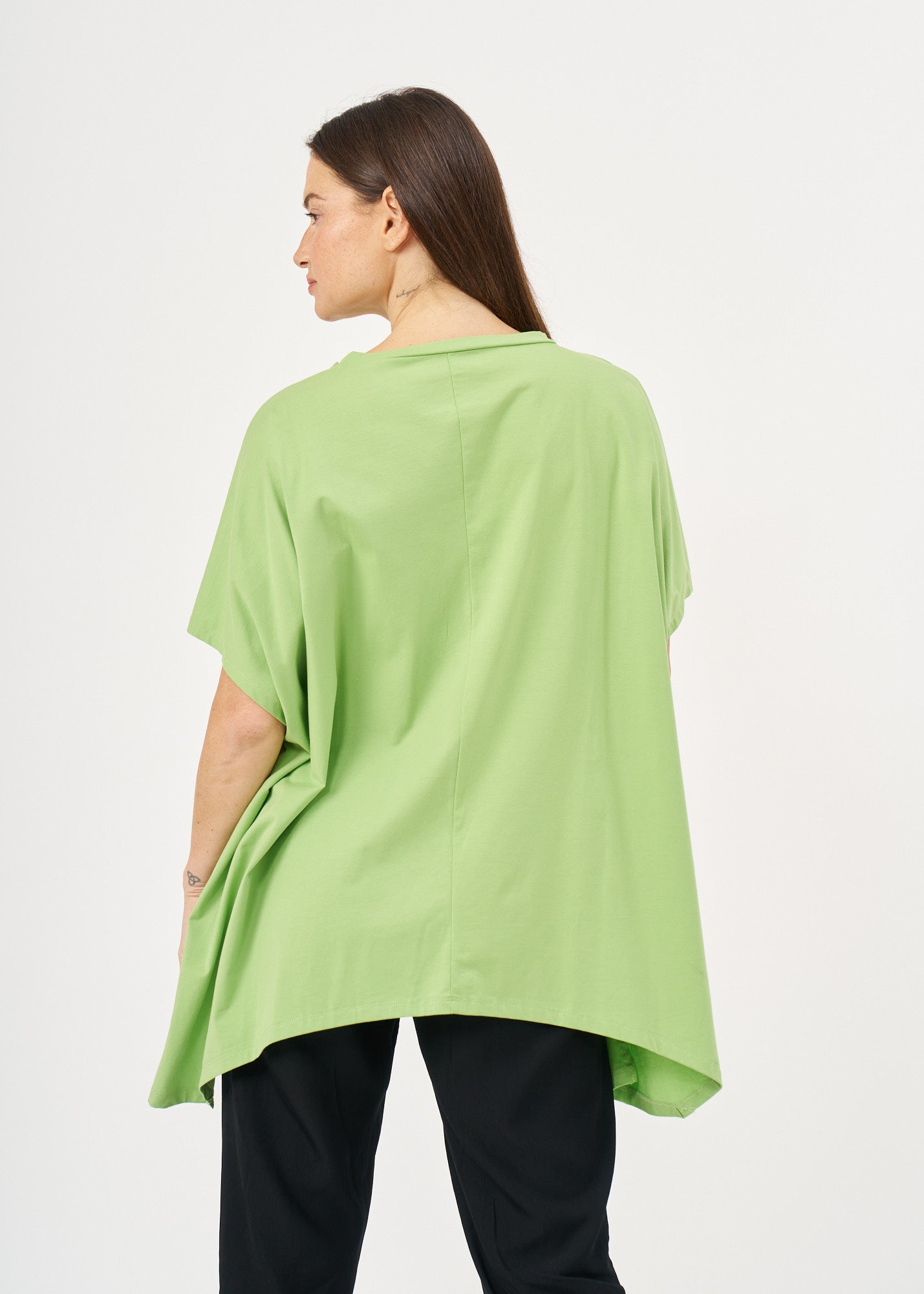 A shirt without a shirt that expands on the sides with a green loop