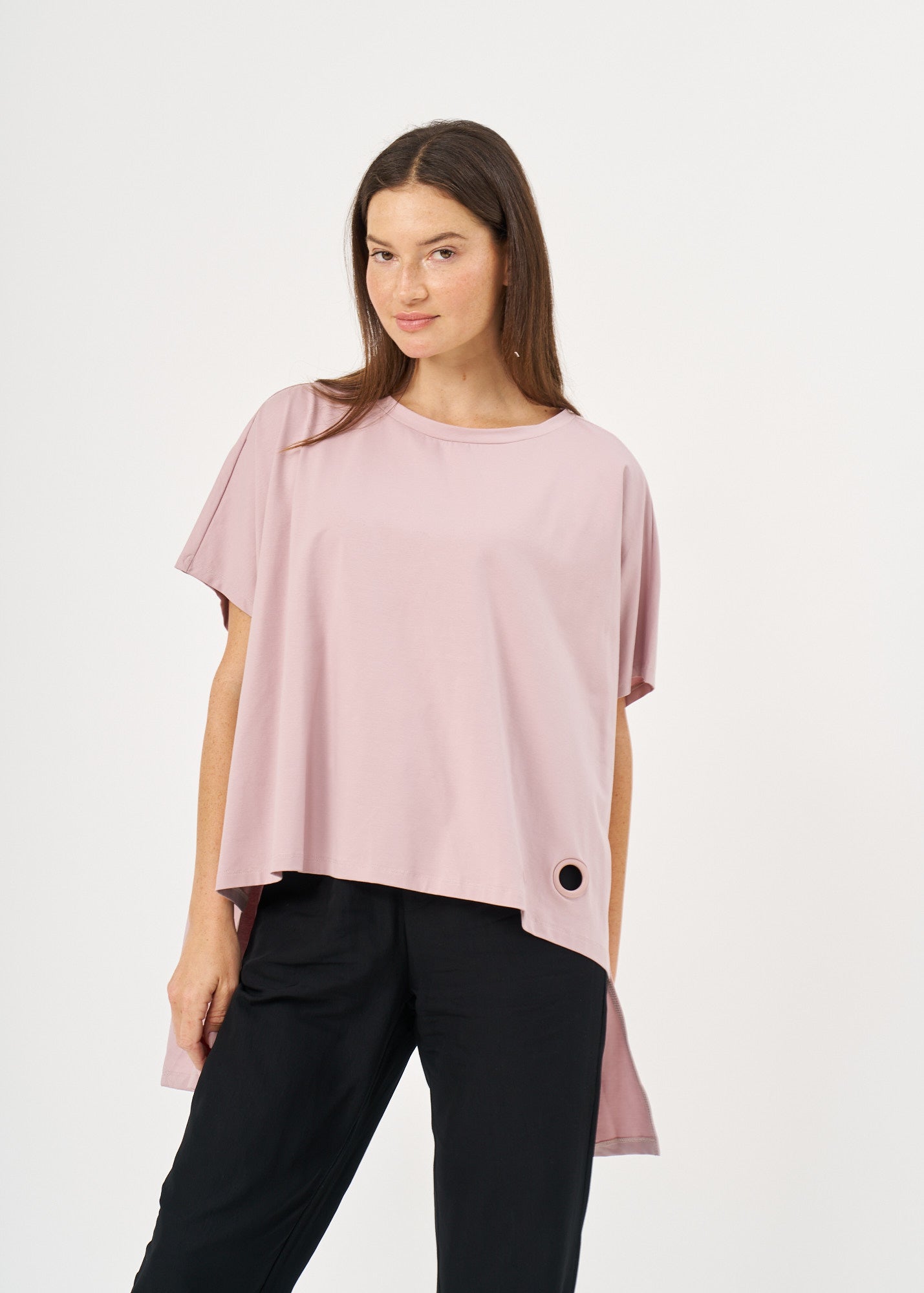 Pink button-down shirt with wide sides and a loop