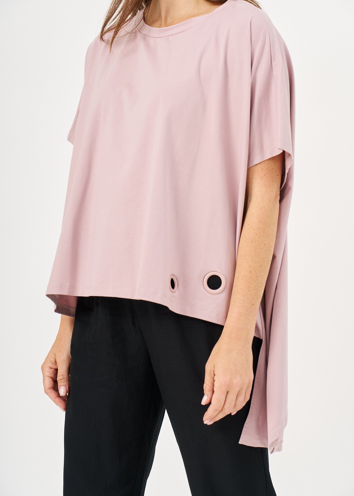 Pink button-down shirt with wide sides and a loop