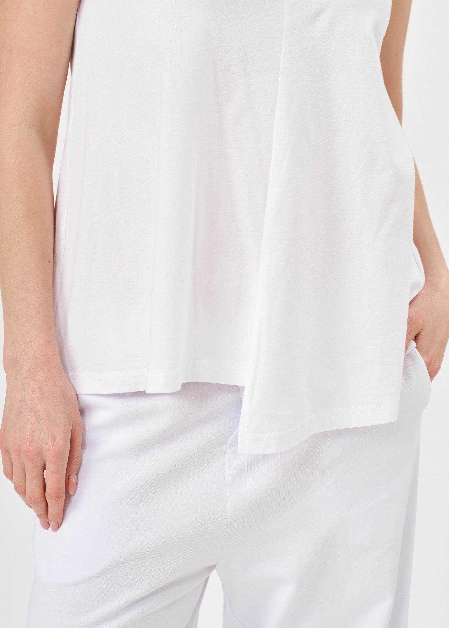 White tank top with a flowing collar