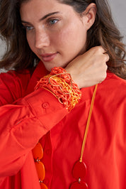 Handmade braided cord heart bracelet orange wash