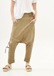 Baggy pants with diagonal cuts and buckles, brown wash