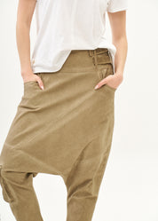 Baggy pants with diagonal cuts and buckles, brown wash