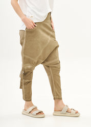 Baggy pants with diagonal cuts and buckles, brown wash