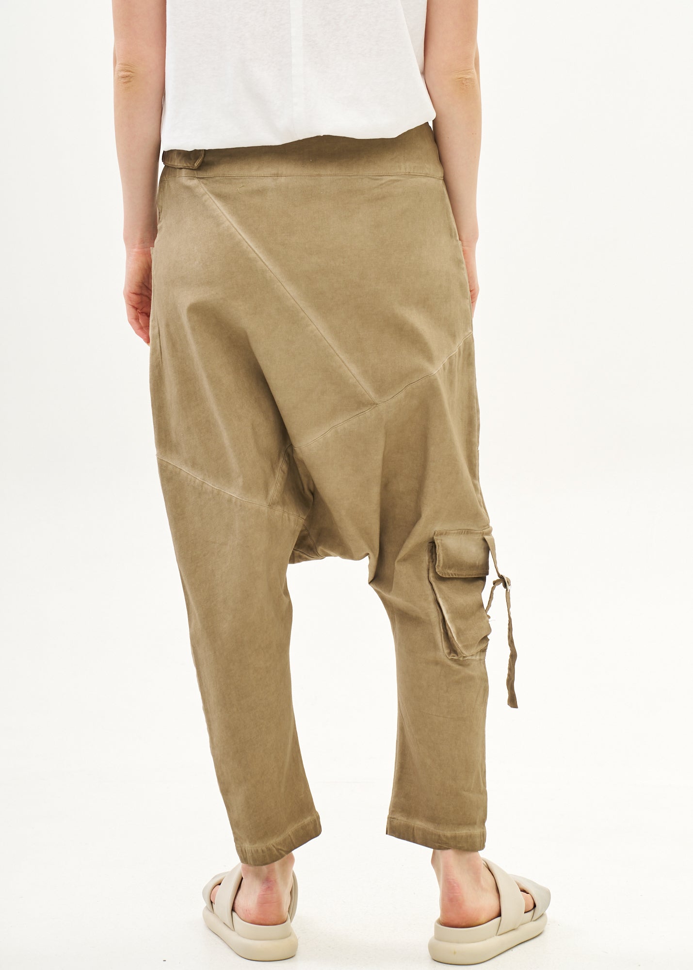 Baggy pants with diagonal cuts and buckles, brown wash