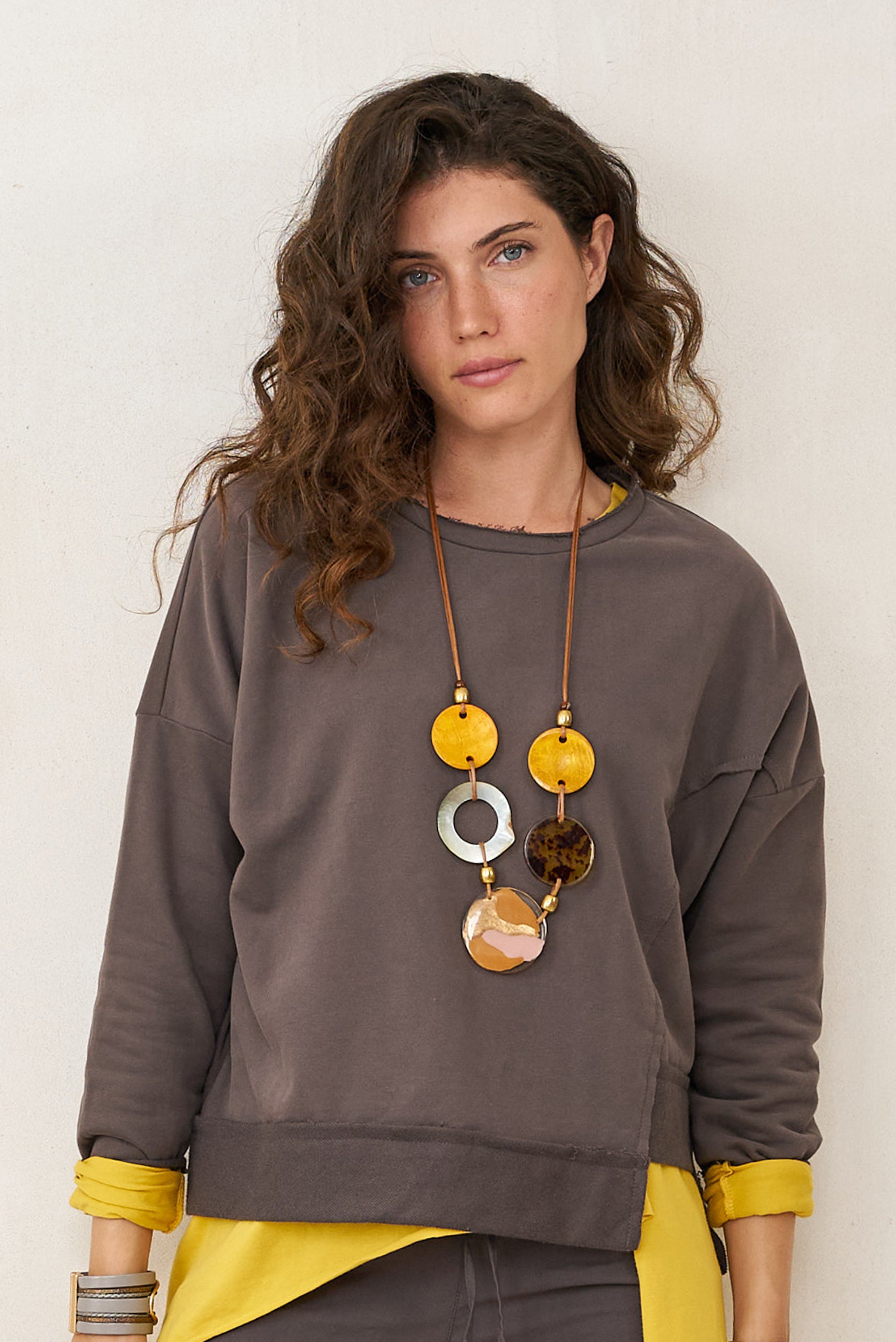 Coconut resin necklace and mustard shell ring