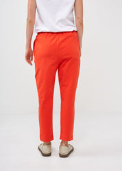 Pants with a seam in the middle and a red patch