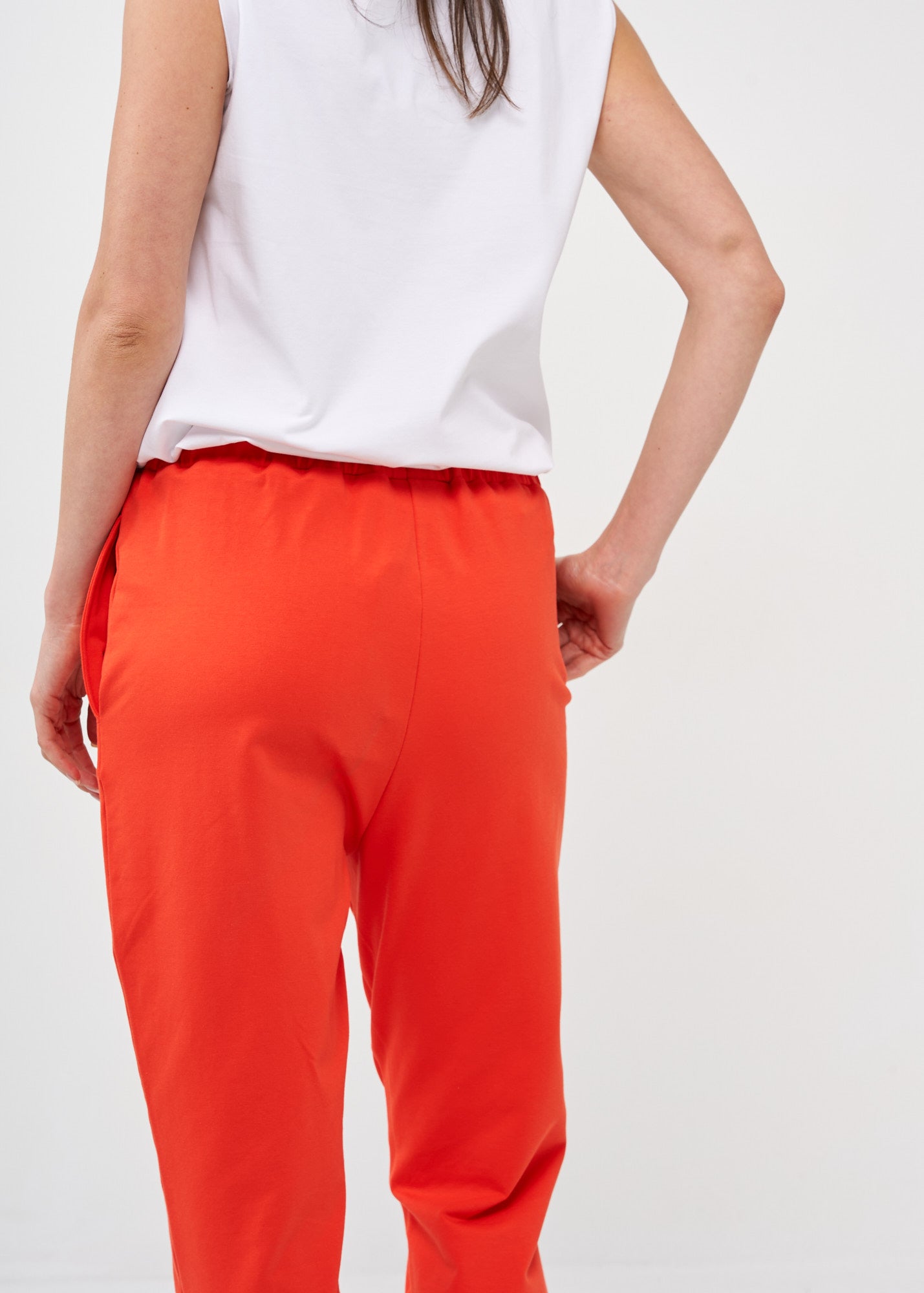Pants with a seam in the middle and a red patch