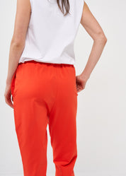 Pants with a seam in the middle and a red patch