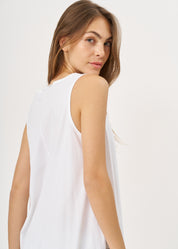 White flared tank top with a white flared hem