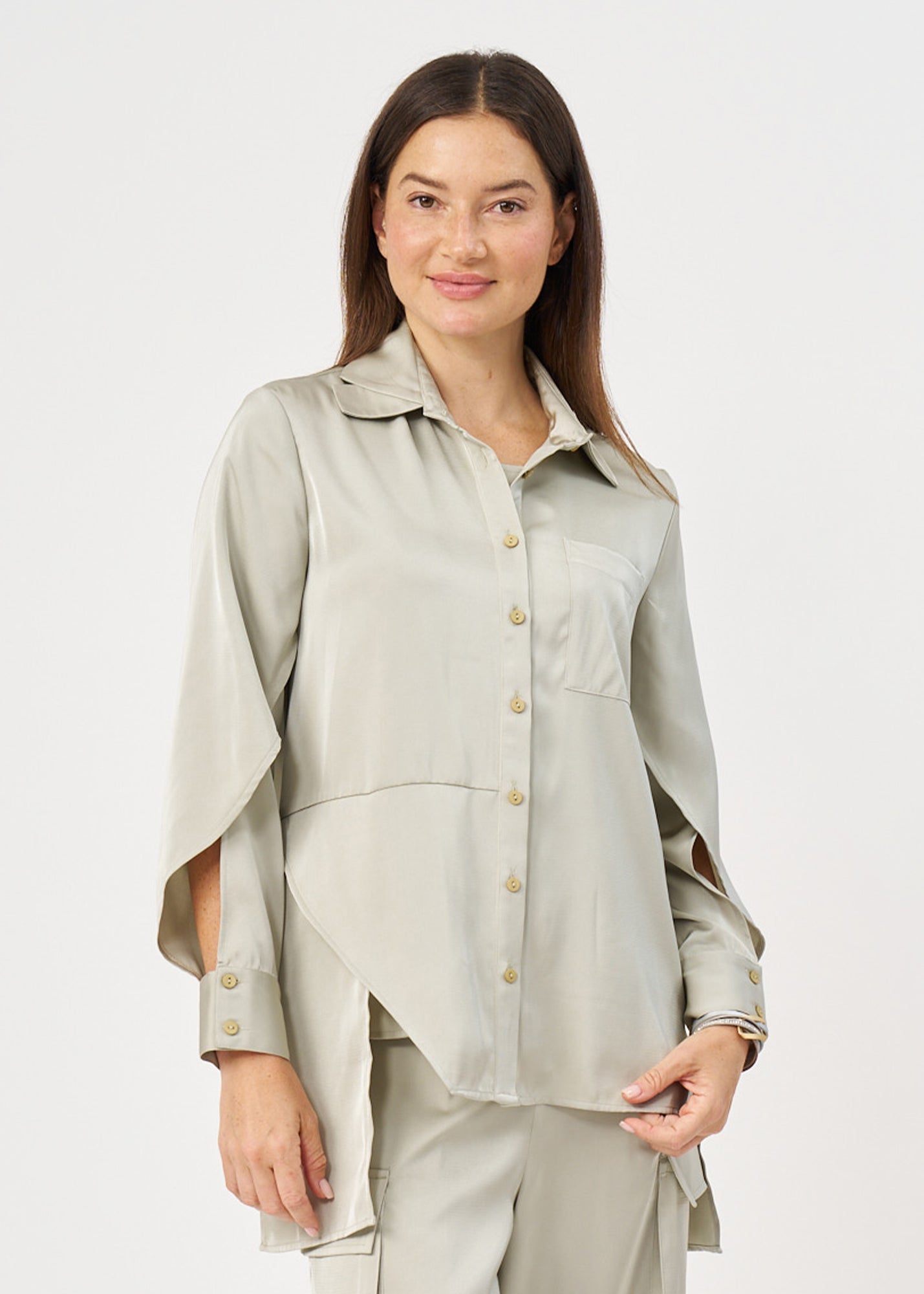 Green satin button-down shirt with open sleeves