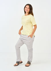 Yellow short sleeve shirt with prominent cuts