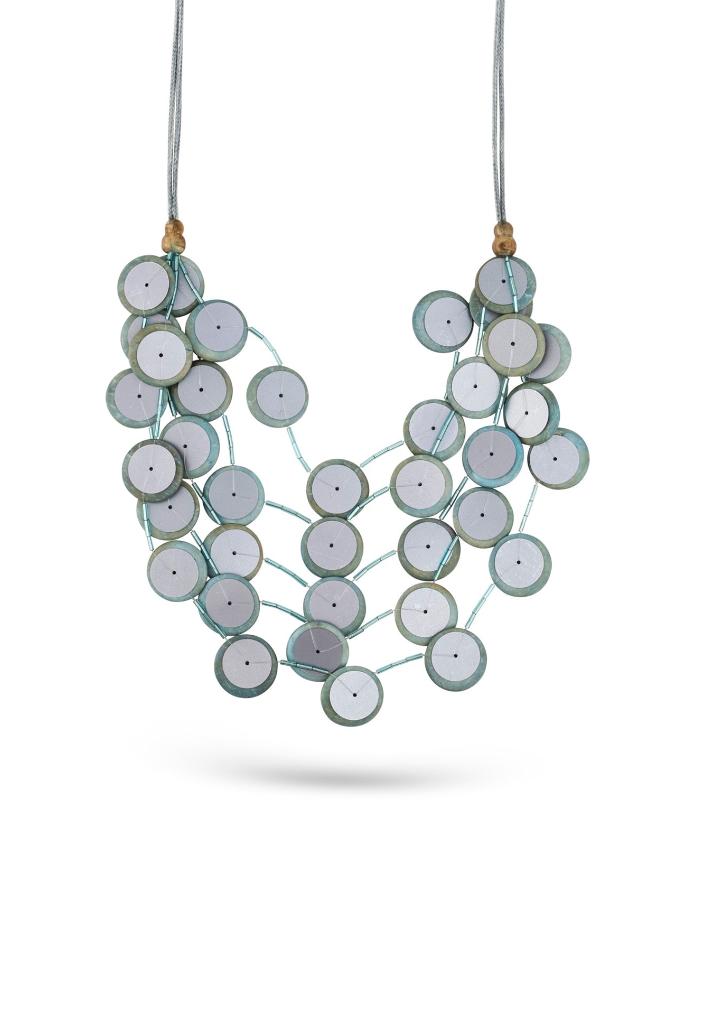 Handmade necklace with coconut buttons, sequins and light blue plastic beads