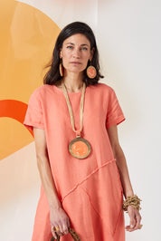 Wash circle necklace made of orange mango wood