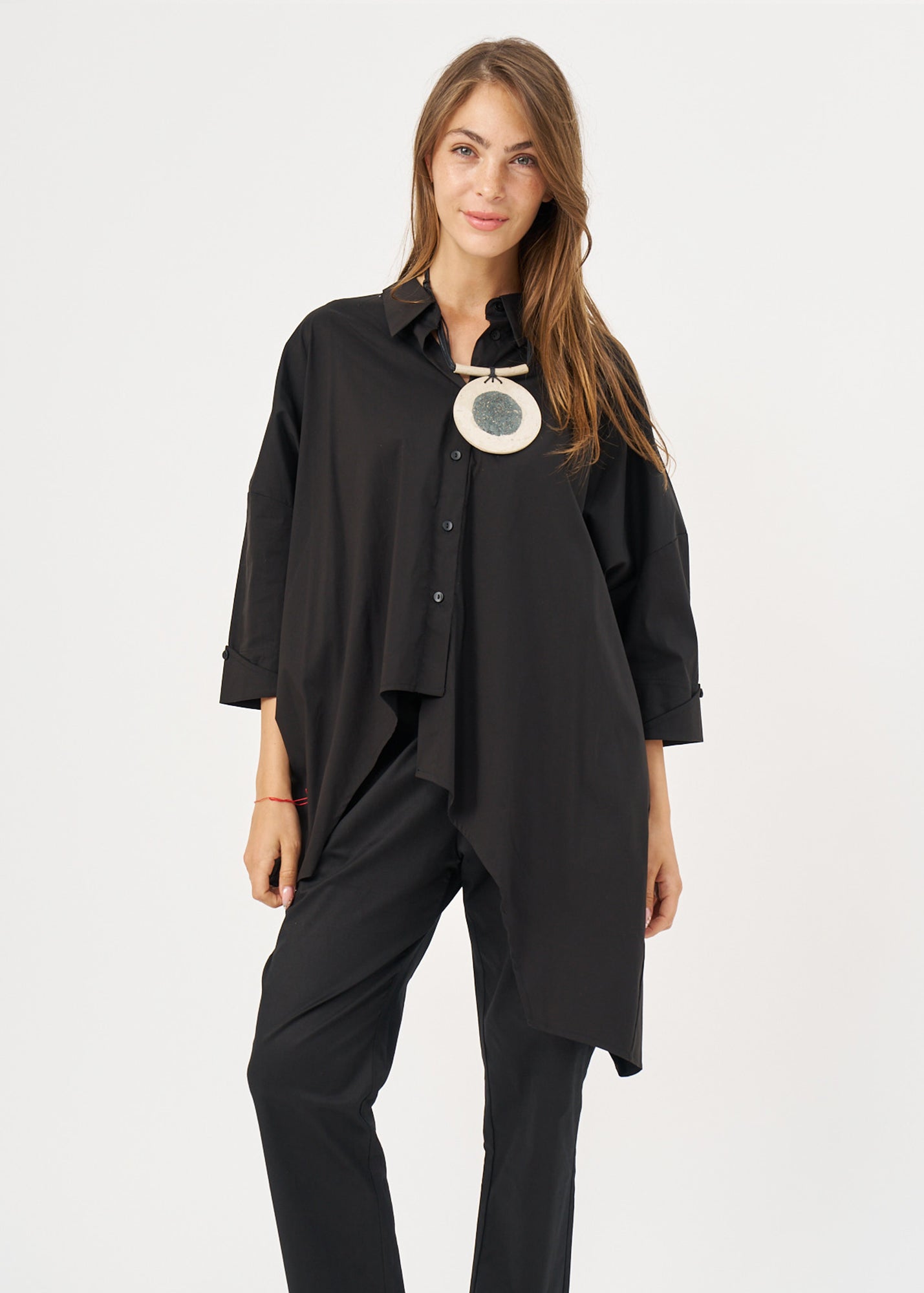 Black button-down shirt with rounded hem