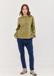 Half-turned green button-down shirt