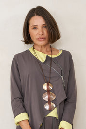 Handmade necklace with 3 shells and a brown ribbon