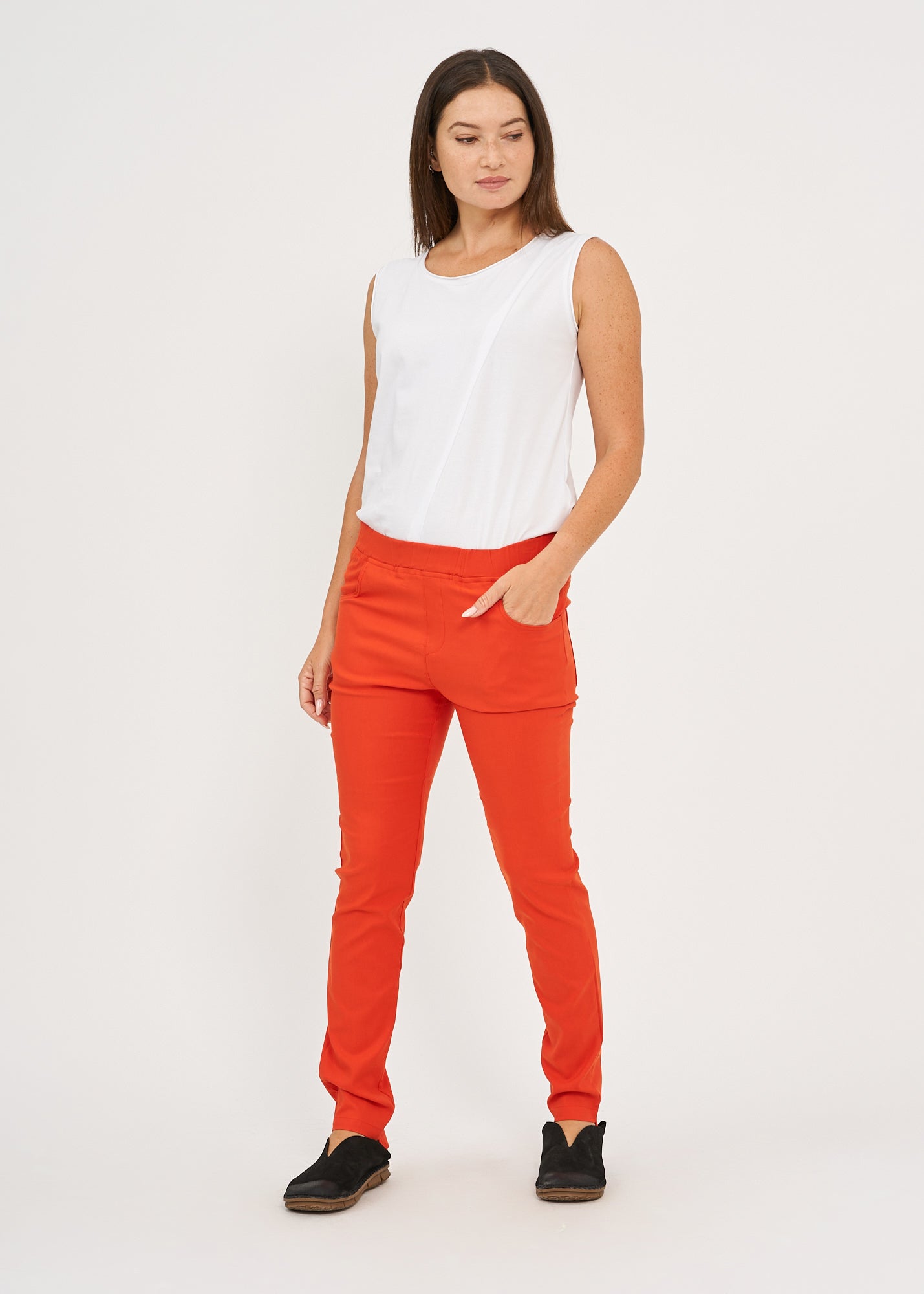 Orange rubber top tight pants