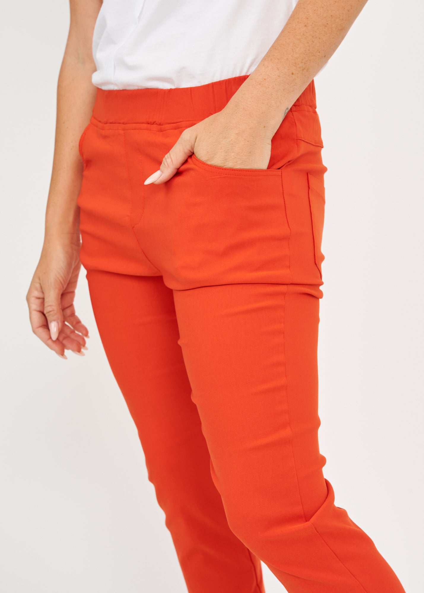 Orange rubber top tight pants