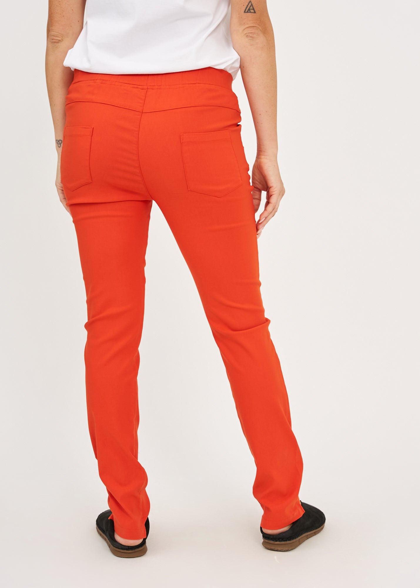 Orange rubber top tight pants