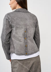 Short jacket with buttons on the back and large pockets on the front, dark gray wash