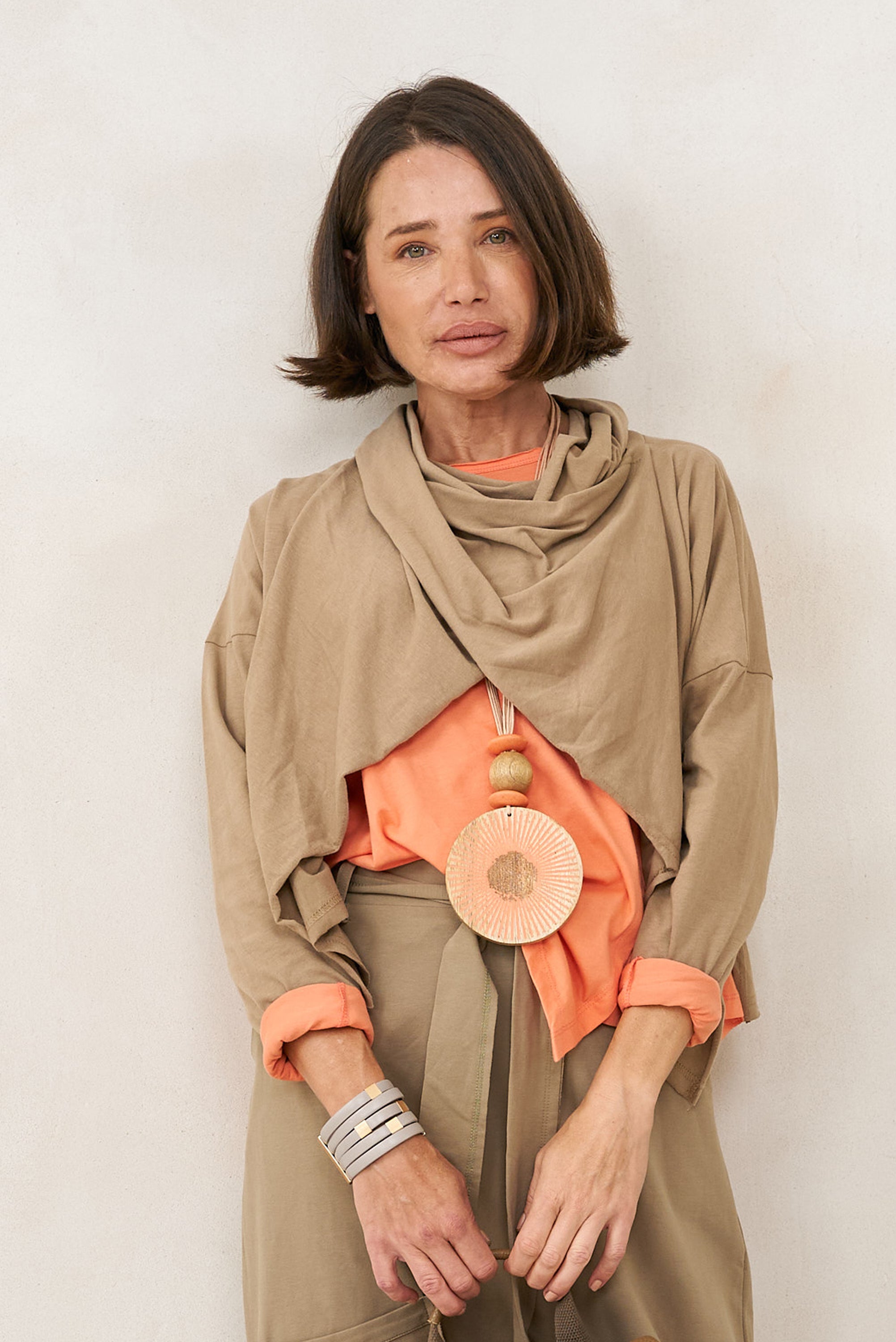 Mango wood necklace with purple painted stripes texture