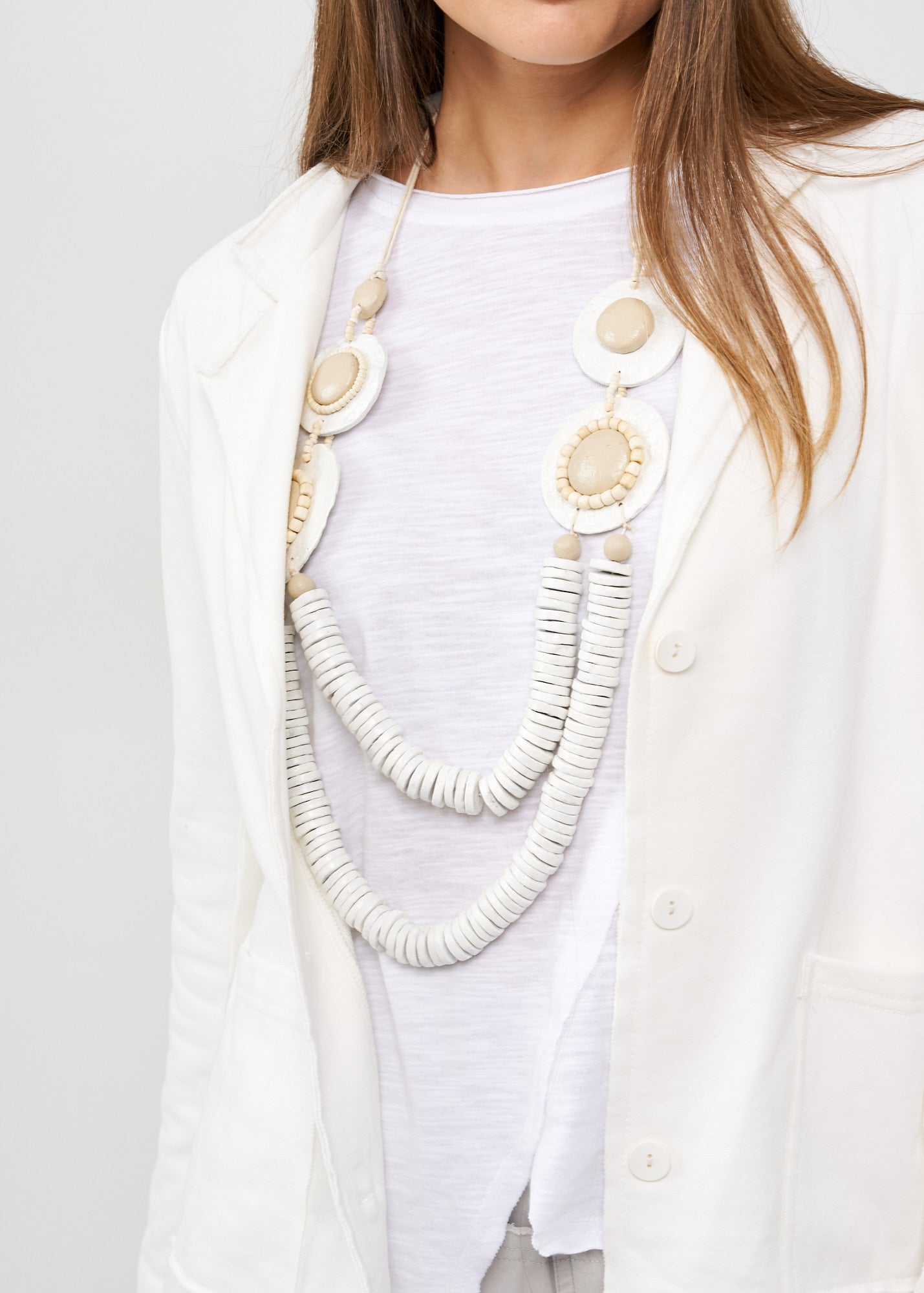 בלייזר תפרים חיצוניים לבן