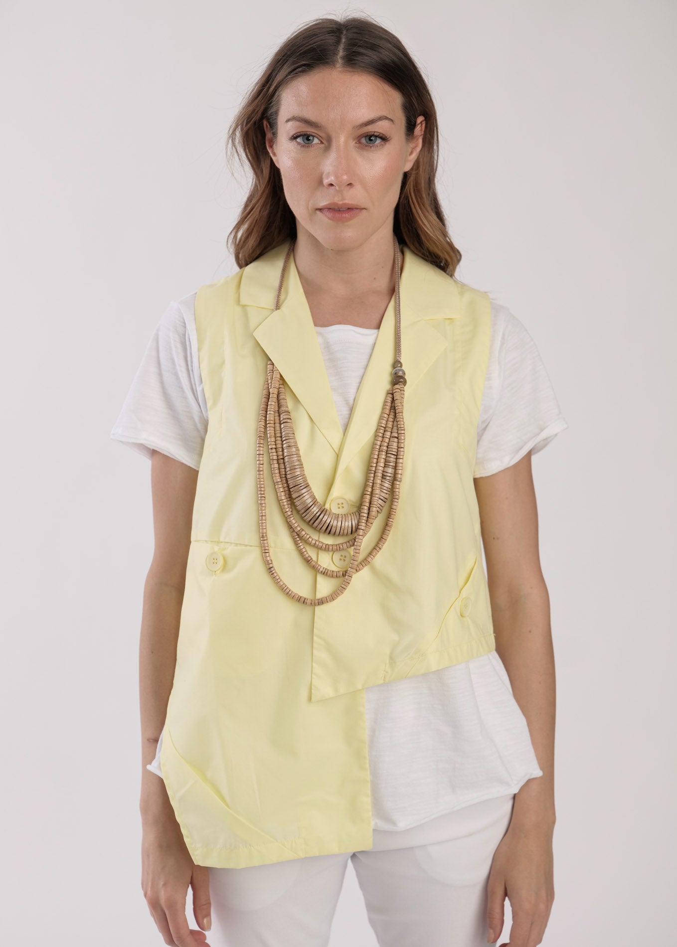 Yellow asymmetric vest with pockets