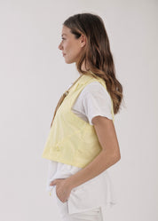 Yellow asymmetric vest with pockets
