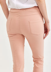 Розовые резиновые узкие брюки