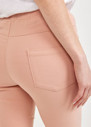 Розовые резиновые узкие брюки