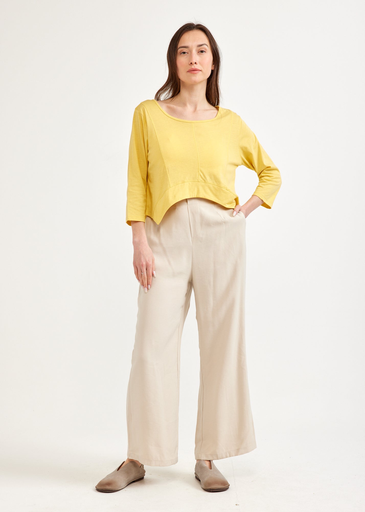 Yellow 3/4 sleeve shirt with rounded ending