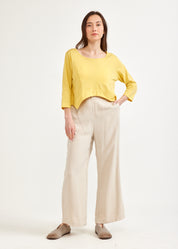 Yellow 3/4 sleeve shirt with rounded ending
